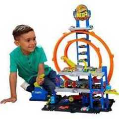 Hot Wheels Mega Loop Garage Track Set with Toy Car & Helicopter